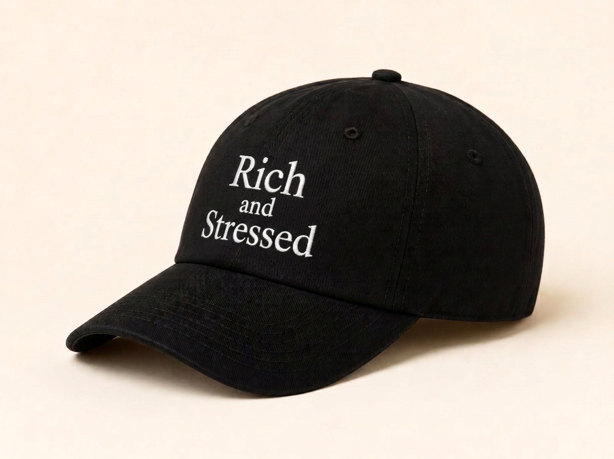 Black cotton Rich and Stressed cap with white embroidered serif lettering